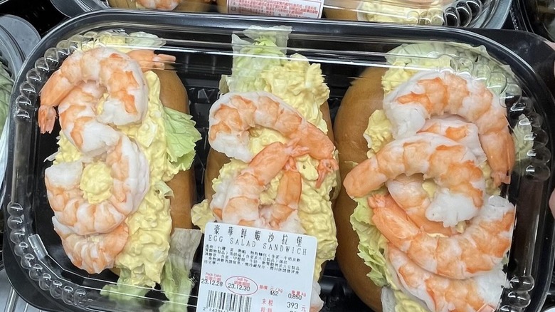 Egg Salad Sandwich three-pack topped with shrimp