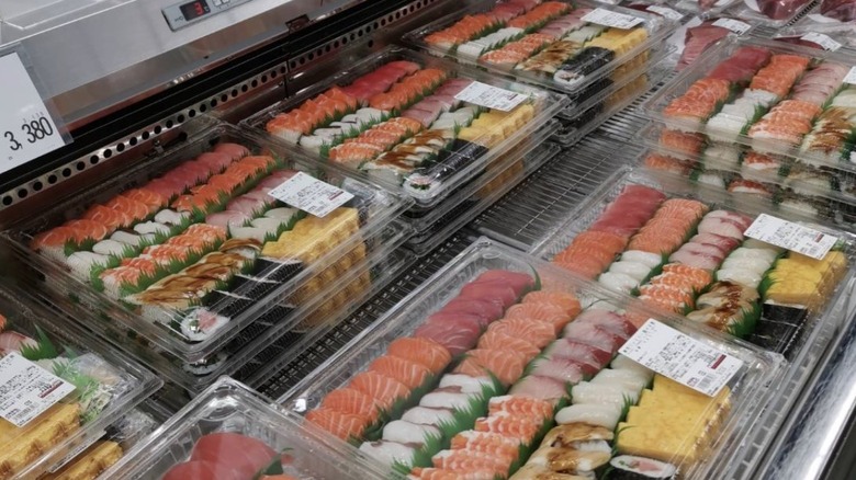 Platters of assorted sushi at Costco Japan