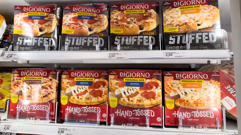 Freezer filled with DiGiorno pizzas