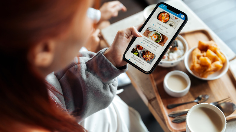 A person using a food delivery app