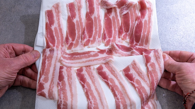 raw bacon on paper towels