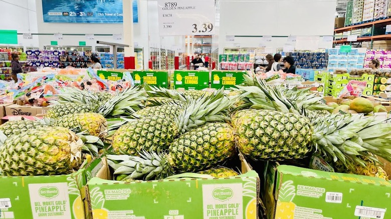 Boxes of pineapples on display in Costco
