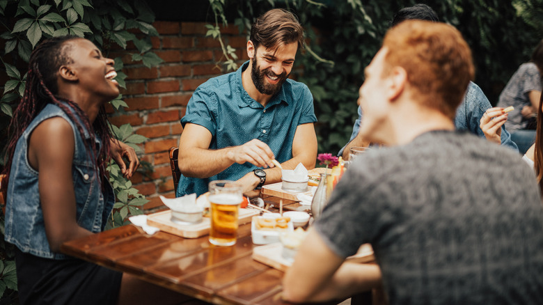 friends eating dinner at a restaurant