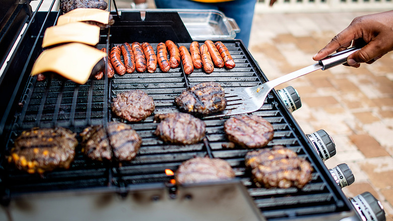 Cookout grill with hot dogs and burgers