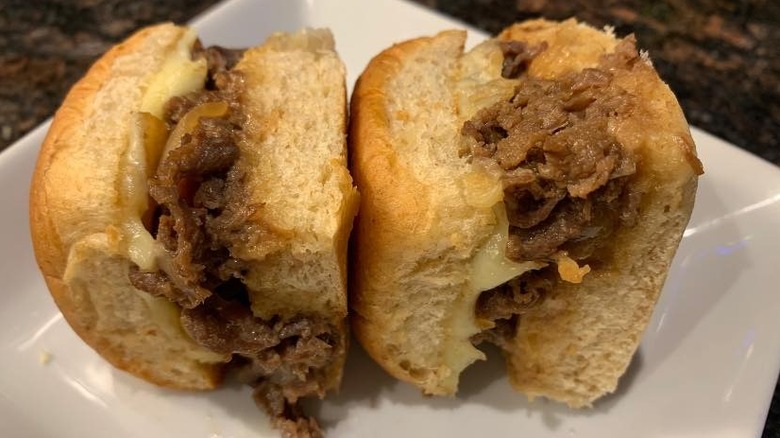 Bulgogi sliders sit on a plate.