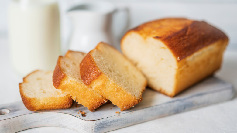 Sliced pound cake on wooden board