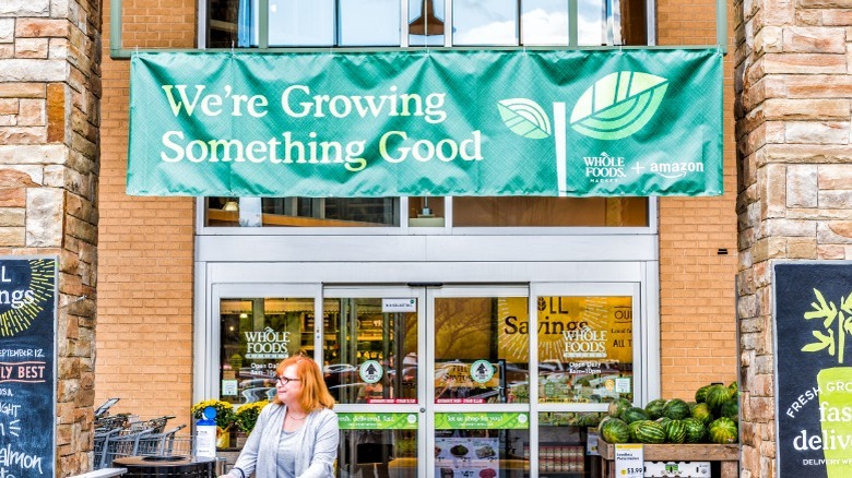 woman leaving whole foods