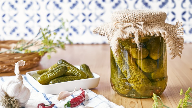 pickled cucumbers in a jar