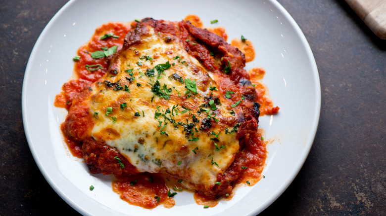 chicken parmesan on white plate