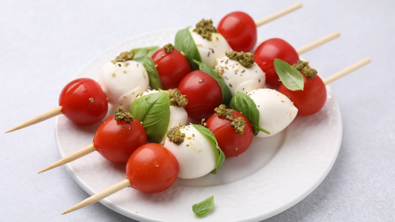 mozzarella, tomato, and pesto skewers