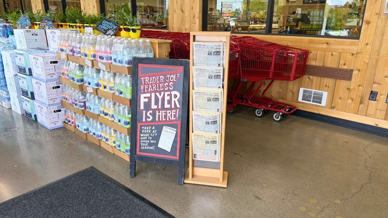 The front of a Trader Joe's store with shopping carts.