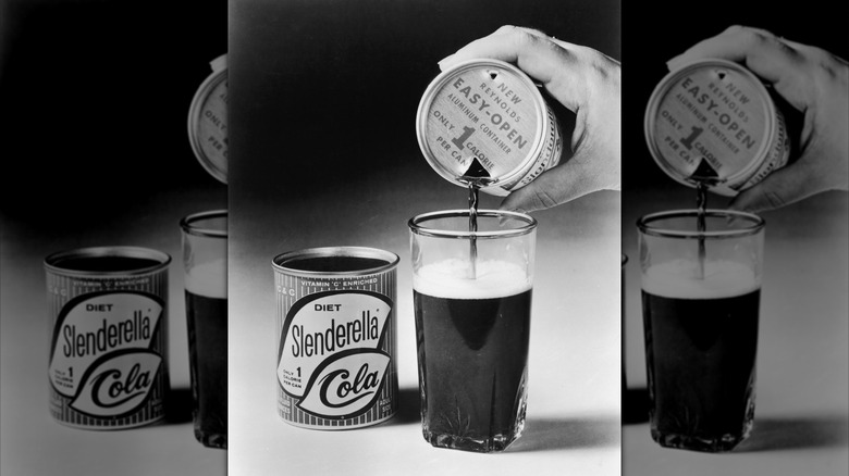 Black-and-white image of a hand pouring Slenderella cola into a glass
