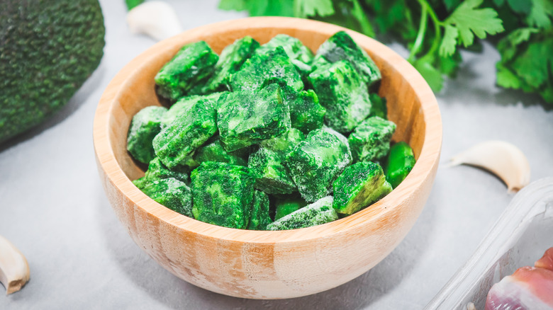 Frozen diced spinach in a bowl