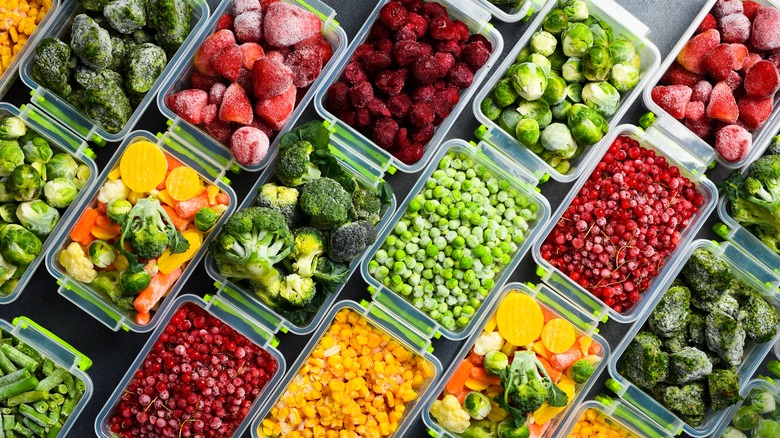 Frozen fruit and vegetables in plastic containers