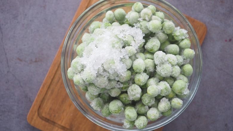 Frozen green peas in a bowl