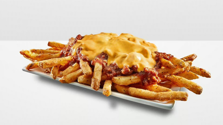 An order of Checkers & Rally's Cheese Chili Cheese Fries on a white plate