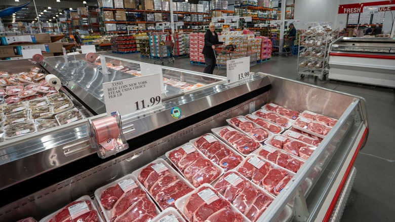 Meat department in Costco with steaks on display