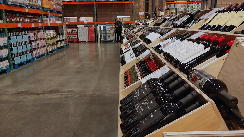 Wine aisle in Costco with assorted reds
