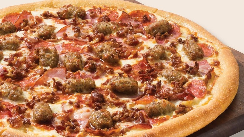 Closeup of a Marco's Pizza All Meat Pizza.