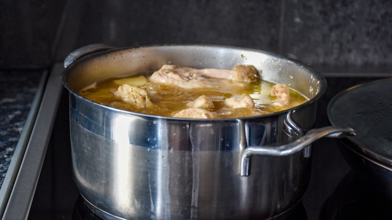 chicken bone broth on stove