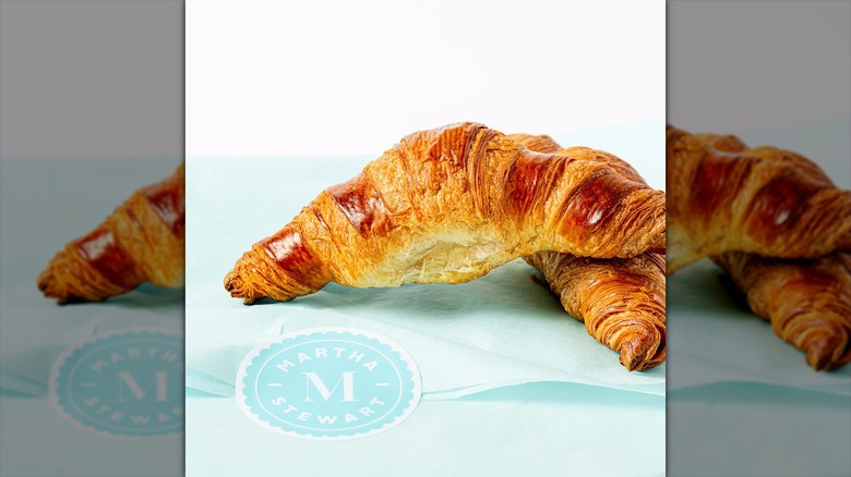 A croissant sits above a Martha Stewart logo.