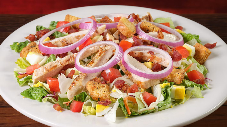 Texas Roadhouse's Grilled Chicken Salad in a white ceramic bowl