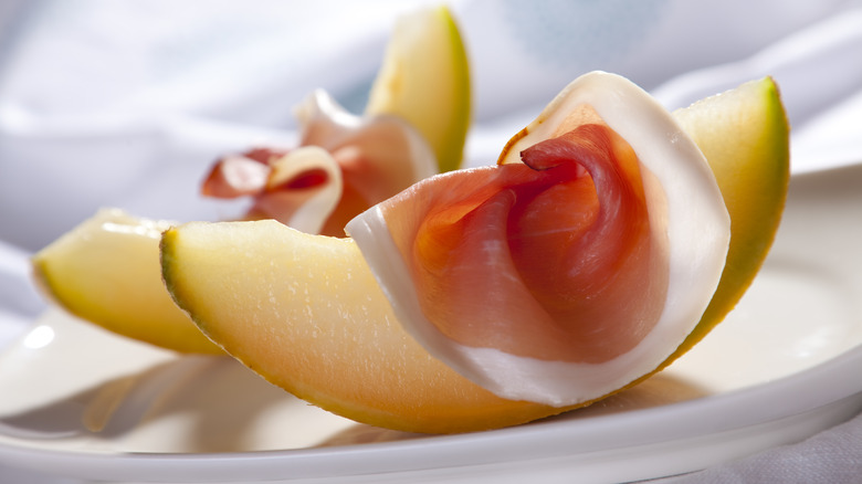 Slices of melon topped with prosciutto