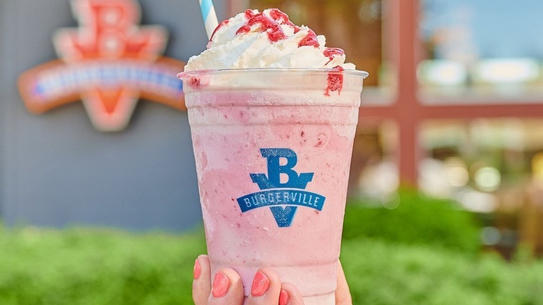 Hand holding Burgerville milkshake