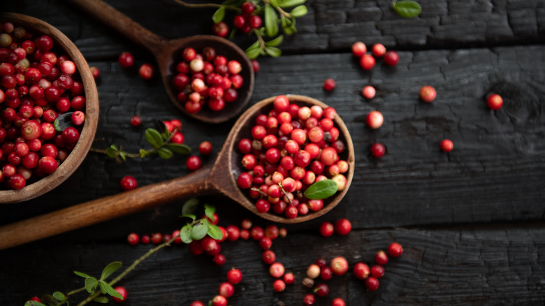 cranberries in a wooden spoon