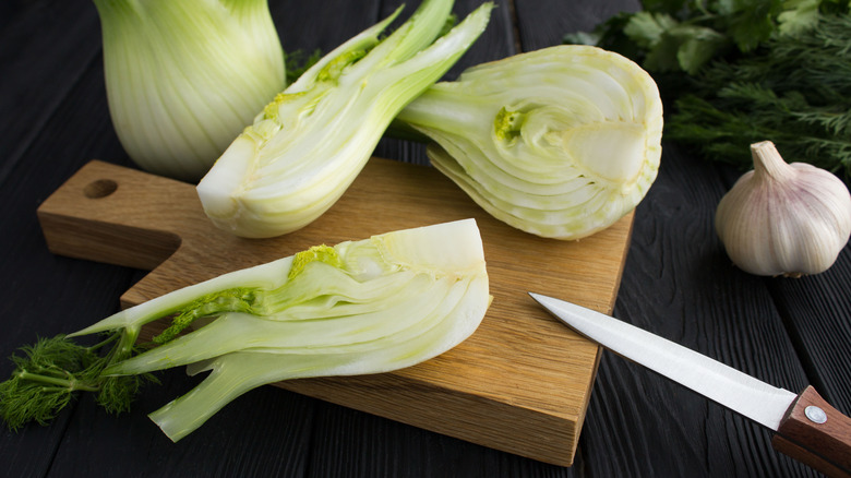 chopped fennel on wooden board