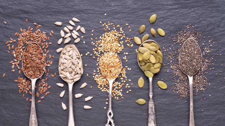 five spoonfuls of different seeds