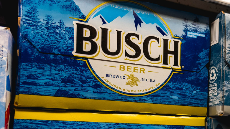 A case of Busch Beer on display in a store