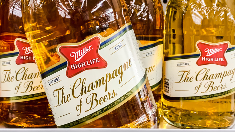 Close-up of the labels on bottles of Miller High Life