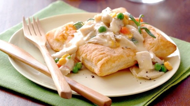 Puff pastry covered in a chicken pot pie gravy