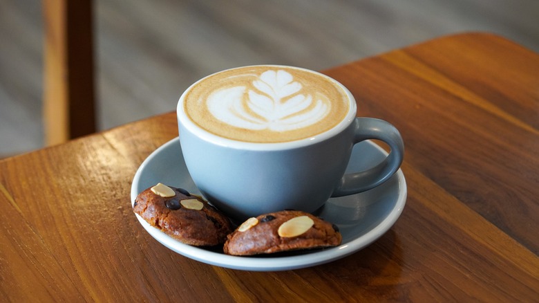 salted latte in mug with cookies