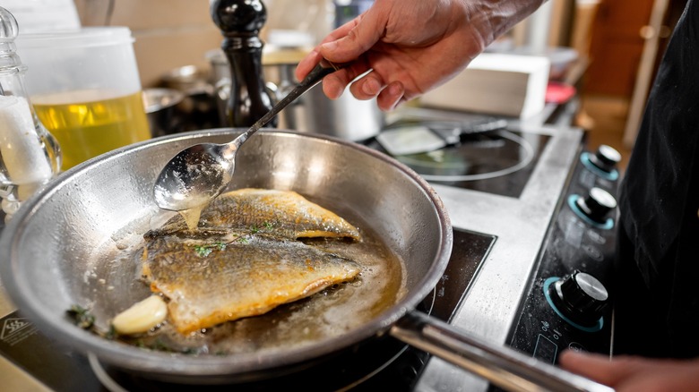 frying fish in hot oil