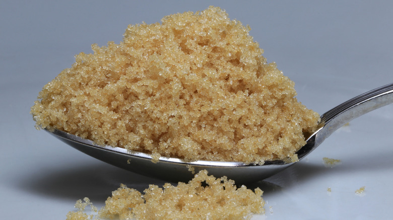 scoop of soft brown sugar on spoon