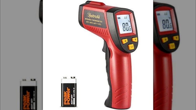 An AstroAI Infrared Thermometer 380, No Touch Digital Laser Temperature Gun and its battery pack are shown against a white background.