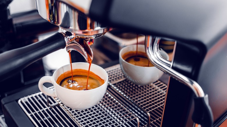 coffee cups under espresso machine
