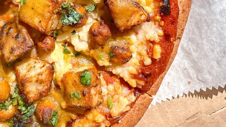 Pizza made with curry sauce