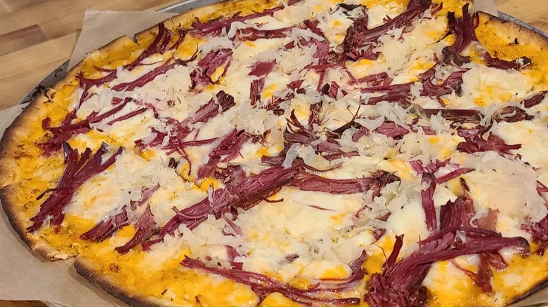 Reuben pizza with thousand island dressing