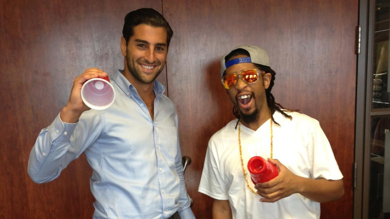 Solomon Fallas and DJ LIL JON showing off the cups