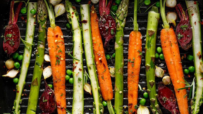 carrots cooking on a grill 