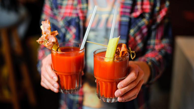Person carrying Bloody Marys