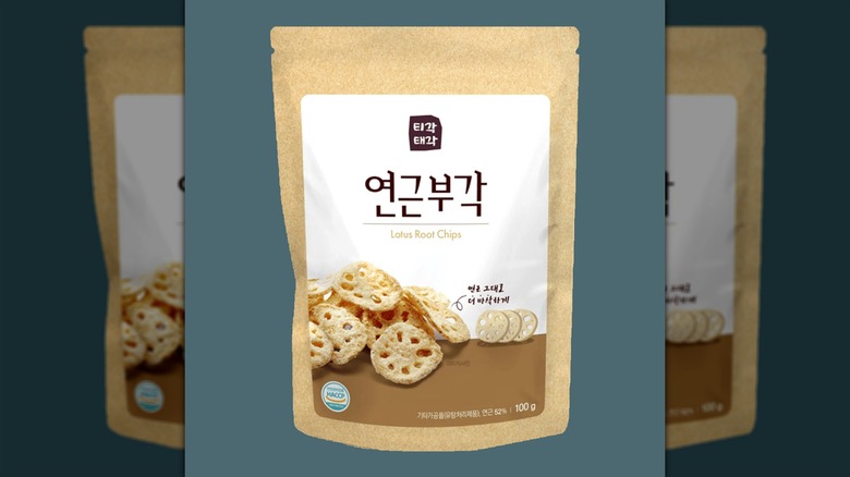 A package of Lotus Root Chips against a gray background.