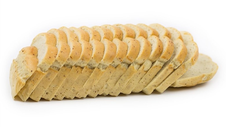 A loaf of ThinSlim Foods bread against a white background.