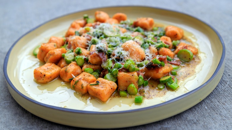 sweet potato gnocchi with butter and asparagus