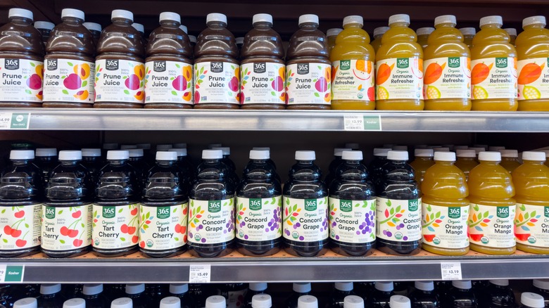 Shelves of store branded juice