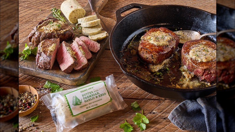 Prepared meat dishes topped with Trader Joe's Butter with Parmesan, Garlic & Herb