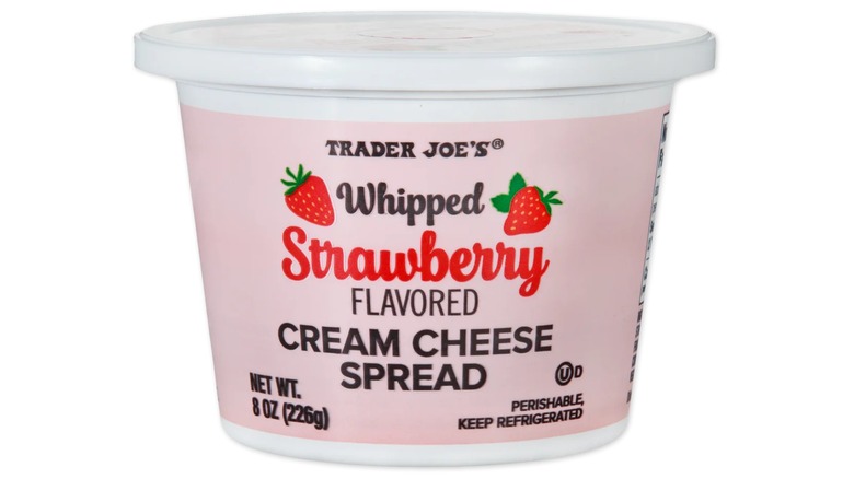 A container of Trader Joe's Whipped Strawberry Flavored Cream Cheese Spread